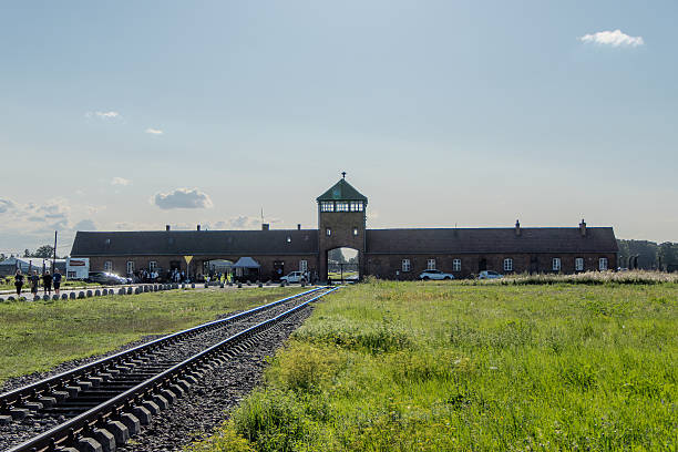 Auschwitz, Poland, August 6, 2025. Auschwitz Birkenau Concentration and Extermination Camp.  Birkenau entrance gate