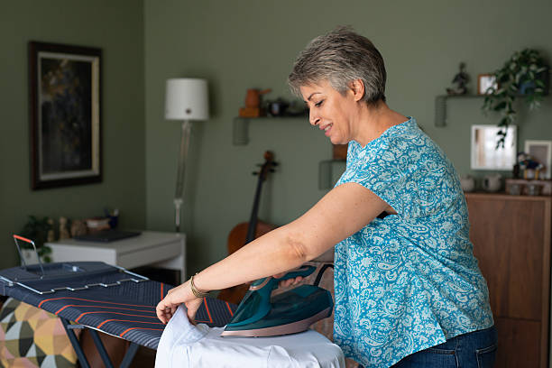 istock A woman is ironing clothes 2235202940