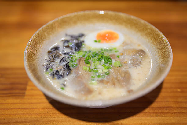 istock Ramen noodles served in bowl on table in Japanese restaurant 2235207845