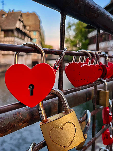 istock Red heart-shaped love lock on bridge in Strasbourg 2235208109