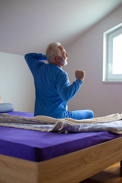 istock Senior man waking up in the morning 2235209923