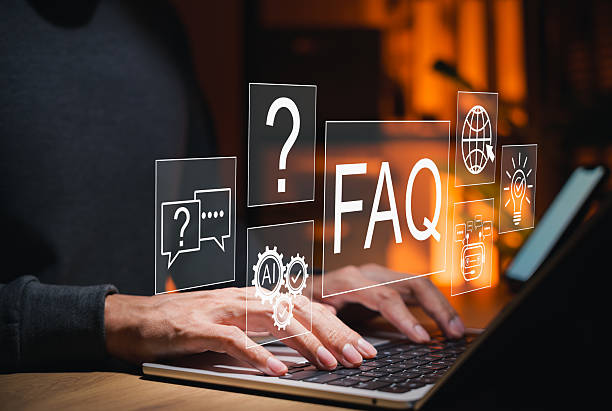 istock FAQ Frequently Asked Questions and AI chatbot support concept. Person typing on laptop, surrounded by question icons, automated answers, global access, intelligent solutions for customer service and digital assistance. Q and A 2235210484