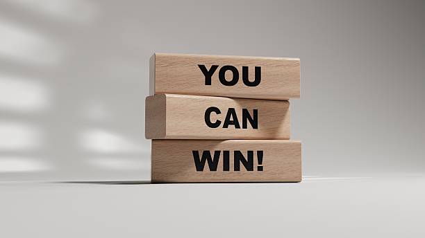 istock YOU CAN WIN! symbol. wooden blocks.Copy space.3D rendering on white background. 2235212817