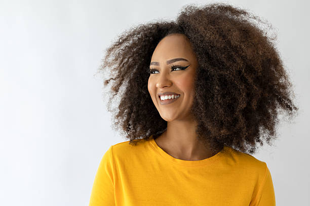 istock Smiling young woman with positive emotion 2235213976