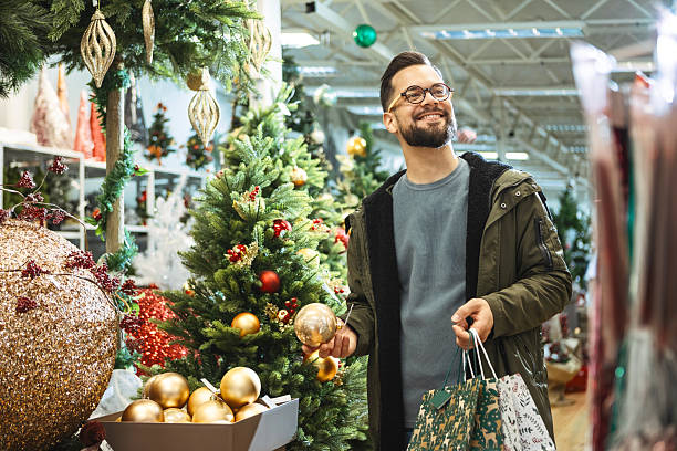 istock Man shopping for Christmas gifts 2235215520