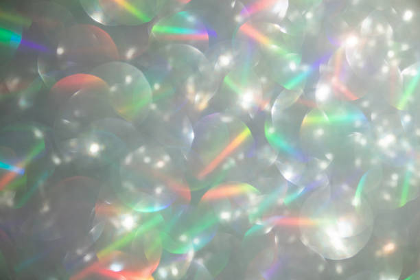 istock Shiny luxury glitter rainbow glow light flare with bokeh background 2235215623