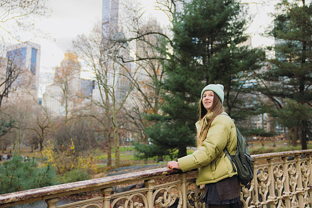 istock Female Exploring New York City With Scenic Fall Colours Around 2235217324