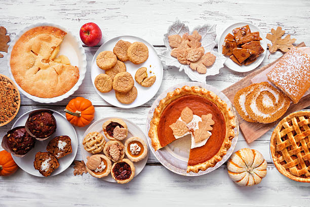 istock Autumn desserts table scene. Overhead view on a white wood background. 2235222006