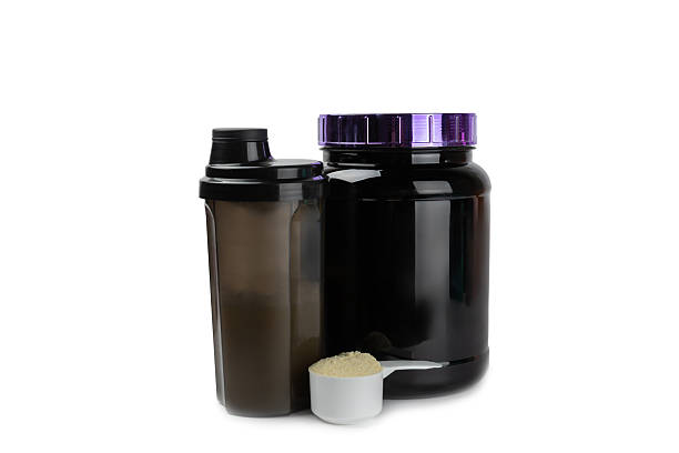 istock Protein powder.protein shake isolated on white background.Shaker bottle with protein.Food supplement.Whey protein powder with shaker for mixing.Sports nutrition.Concept of sports and healthy lifestyle 2235225349