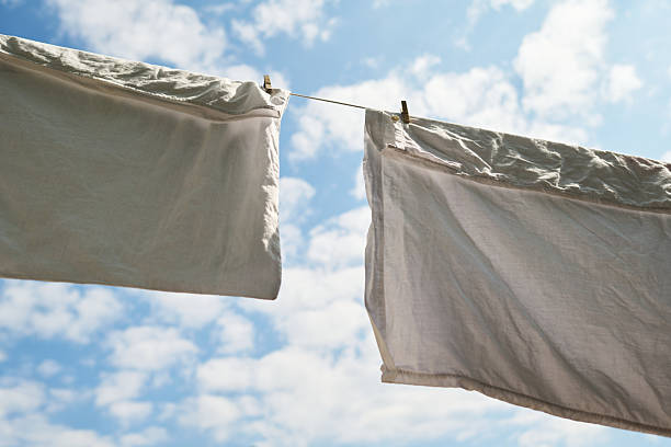 Senior has hanging the laundry for drying
