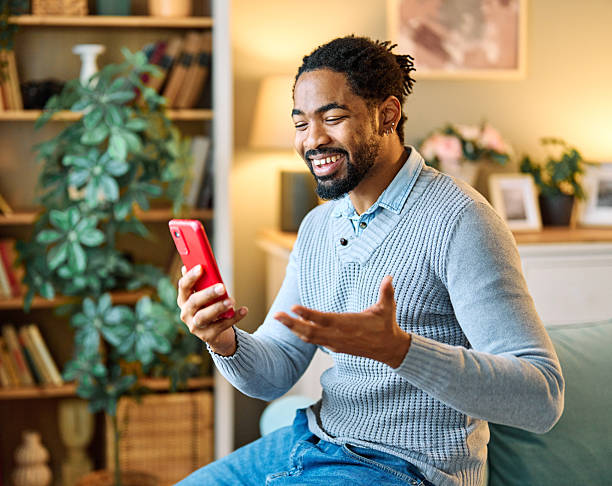 istock man communication phone talking call mobile technology young happy cellphone smiling smartphone conversation call answering chatting speaking 2235226375