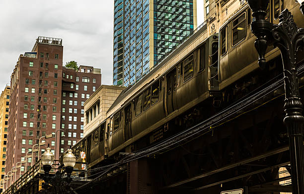 istock Elevated train passing through downtown Chicago with skyscrapers in the background 2235228880