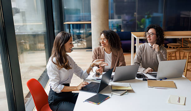 istock A Collaborative Meeting Taking Place in a Modern Workspace with Professionals in Attendance 2235230424