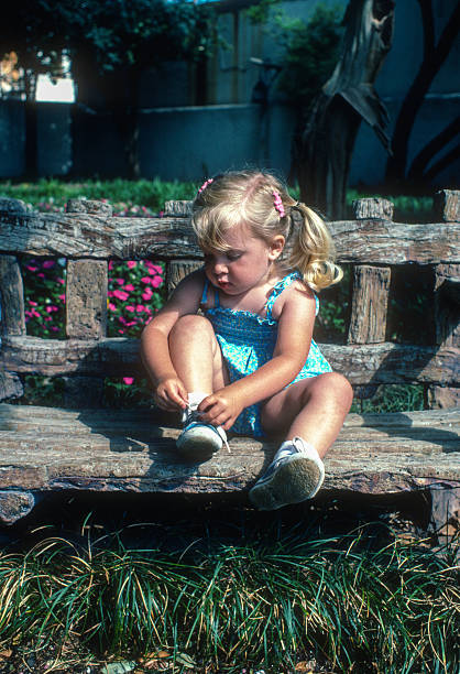 istock San Antonio River Walk - Girl on Bench - 1984 2235231981
