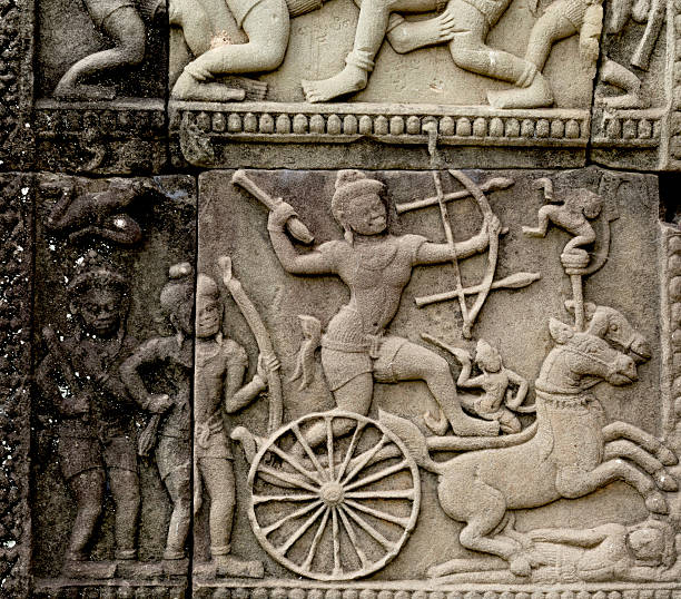 Shot in color detail on the facade of this historic building representing some character, animal or flower. Set at Siem Reap, Angkor Wat , Cambodia, Asia