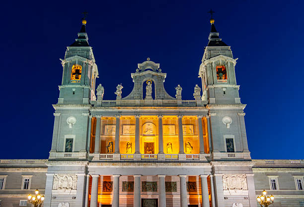 La Almudena cathedral on Armeria square at night, Madrid, Spain