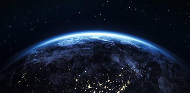 View of planet Earth from space with glowing blue atmosphere, illuminated city lights, and a starry night sky. Concept of global technology, sustainability, astronomy, space exploration, and environmental awareness. \nMaps from NASA: https://visibleearth.nasa.gov/images/144875/earth-at-night-black-marble-2012-color-maps-v2