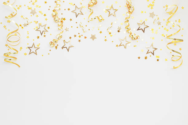 istock New Year, Christmas or birthday festive background top view. Celebration composition with golden confetti stars and serpentine party streamers. 2235234498