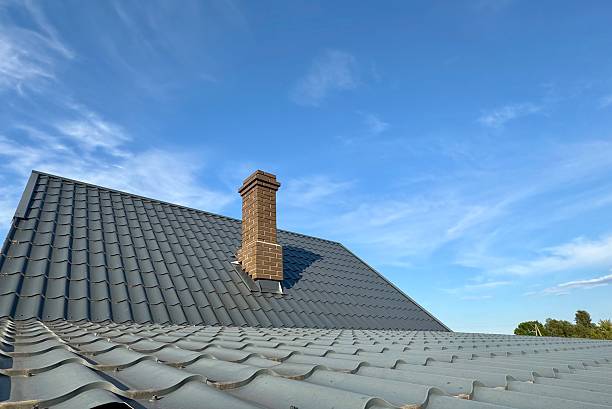 istock House roof with brick chimney and blue sky background 2235242149