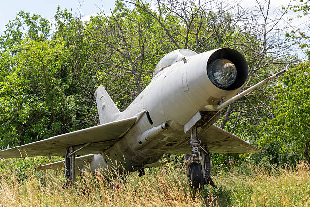 Four antenna pods of an 'Identification Friend or Foe' (IFF) system. The IFF is an electronic equipment used by military aircraft to determine whether other aircraft or systems in the vicinity are friendly or hostile. Its primary purpose is to prevent friendly fire and enhance situational awareness in combat zones, allowing pilots to differentiate between allies, neutral entities, or unknown / enemy contacts. An IFF system typically consists of a transponder and an interrogator. The transponder responds to interrogation signals from other systems, while the interrogator sends out signals to identify aircraft. Operating in multiple modes, including civilian and military, the system often uses encryption for secure communication. When an interrogator sends a radio signal, a compatible transponder on the target aircraft replies with encoded information, such as its identity or status. This response is analyzed to classify the target. However, the IFF system has limitations: it requires both the interrogator and target to have compatible and functional systems, and it does not replace the need for visual identification or other methods of threat assessment in complex scenarios.