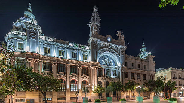 istock Historic Post Office in Valencia night timelapse hyperlapse at City Hall Square. Spain 2235245083