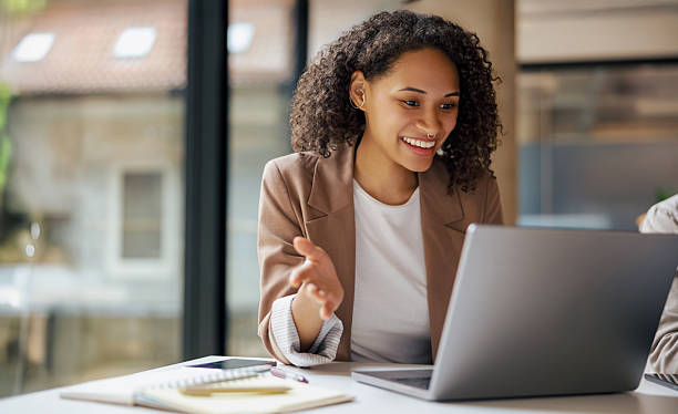 istock A professional woman who is actively engaging in remote work tasks and projects 2235248976