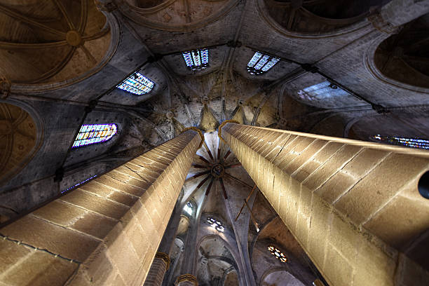 Santa Maria del Mar is a gothic church in the Ribera district of Barcelona, built between 1329 and 1383. The image shows the main ribbed vaulting ceiling inside the wonderful church.