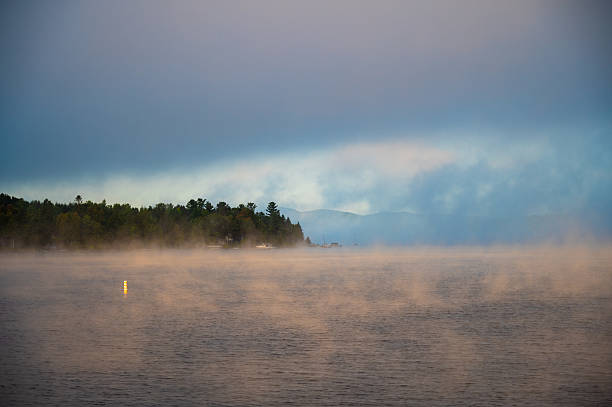 Morning fog over Megantic Lake