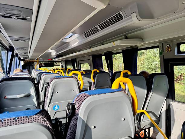 istock Interior of modern passenger bus with seats and windows 2235251779