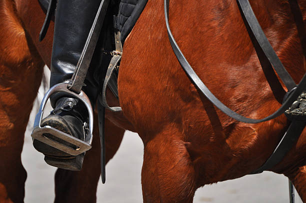 istock Detail of a rider's boot on horseback 2235252544