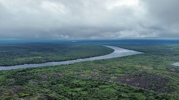 istock Panoramic Aerial View of Mountain Range with River Below 2235257104