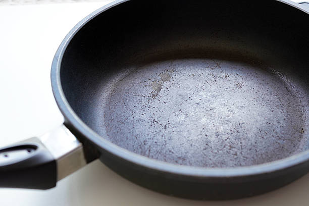 istock An old frying pan with its Teflon coating coming off 2235257427