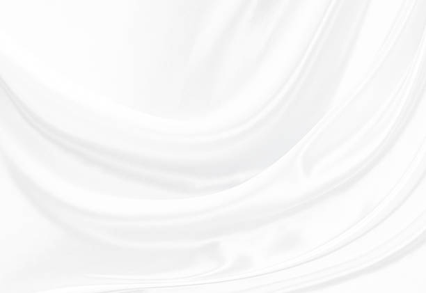istock White gray satin texture that is white silver fabric silk background with beautiful soft blur pattern natural. 2235279637