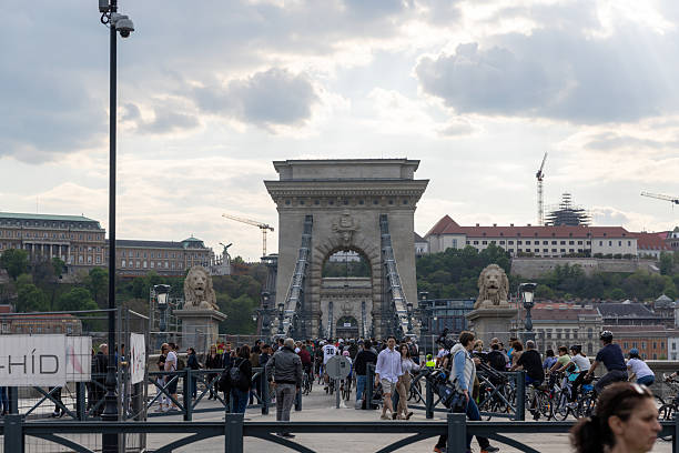 The Széchenyi Chain Bridge, opened in 1849, the first permanent bridge across the Danube in Hungary, and the illuminated Gresham Palace.