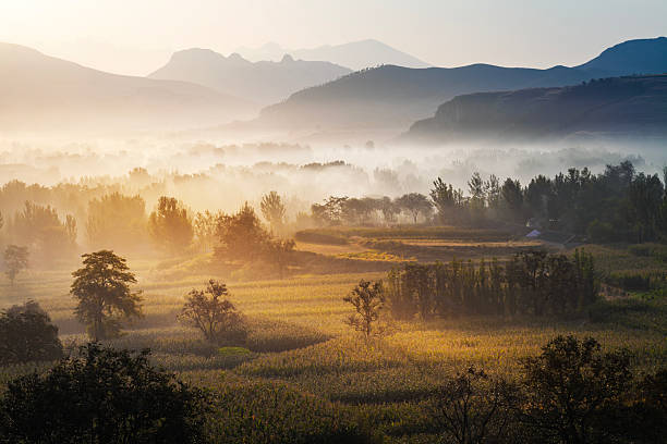 istock The mountains and farmland at sunrise 2235289120
