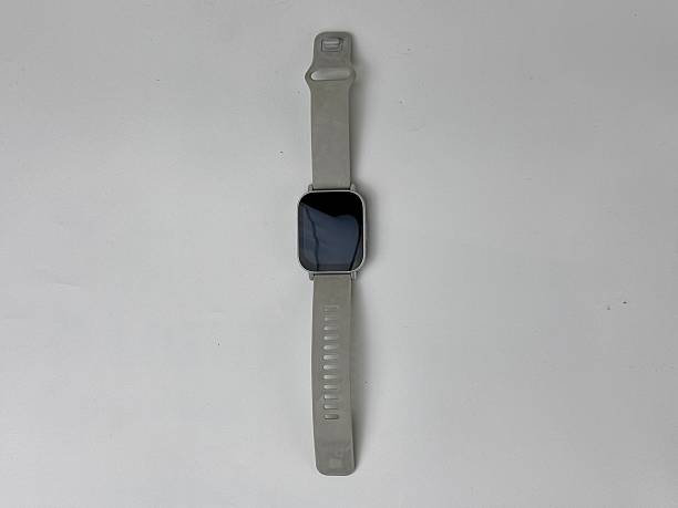 istock Silver square smart watch on plain white background minimalistic device wearable tech health tracker lifestyle accessory digital technology innovative gadget modern design 2235291036