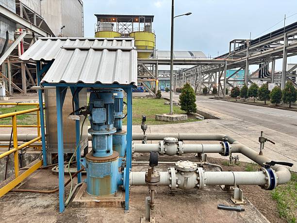 istock Complex industrial facility showcasing water pumping station with pipes and valves installation for water management systems and heavy metal construction in outdoor environmental setting 2235292121