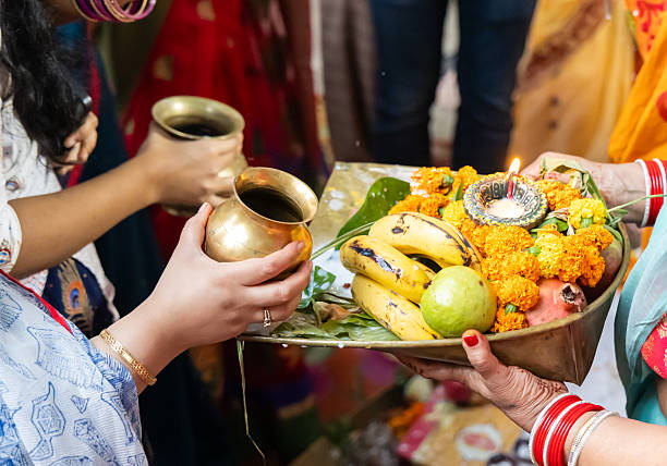istock sacred chhath puja holy rituals with devotee offerings Chhath argha 2235293898