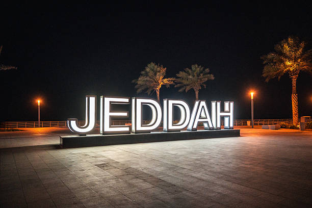 istock Illuminated Jeddah Sign at Night in Corniche District 2235297917