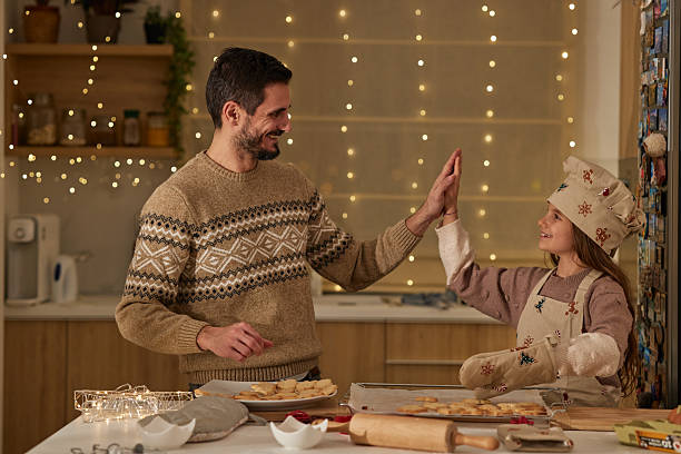 istock Beautiful family making Christmas cookies 2235301813