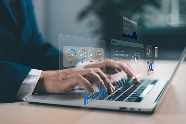 istock Businessman typing on laptop with AI agents holographic interface. Artificial intelligence for data analytics, automation, digital transformation and innovative business solutions. AI agents 2235308788