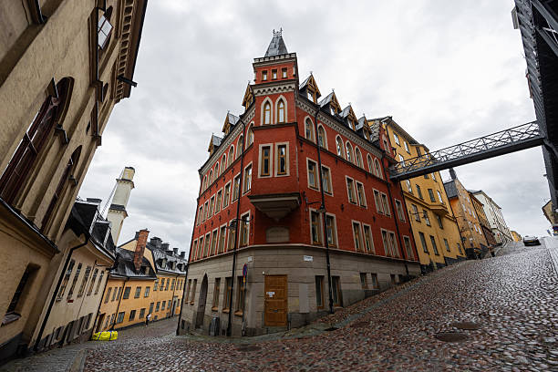 Stockholm, Sweden - June 23, 2025: Red building on the corner at Bellmansgatan.