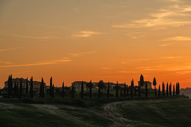 Baccoleno, Asciano, Italy - April 13, 2024: spring sunset over the tuscany hills inside the Crete Senesi area