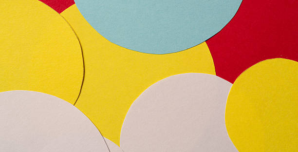istock A background of overlapping colorful circular construction paper 2235322100