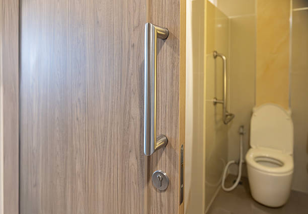 istock Stainless steel handle on toilet sliding door. 2235323475