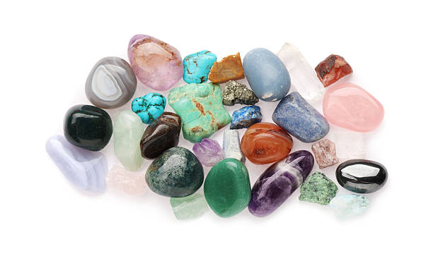 istock Pile of different natural mineral stones isolated on white, top view 2235323621