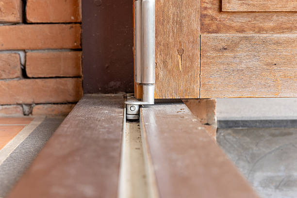 istock Dirty rail bottom  running bifold system is stuck. 2235323627