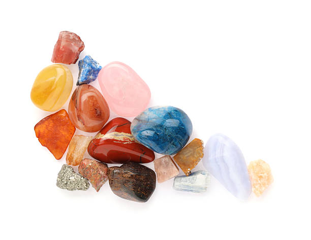 istock Different natural mineral stones isolated on white, top view 2235323643