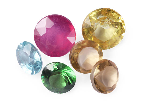 istock Different colorful shiny gemstones isolated on white 2235324234