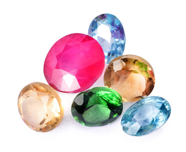 istock Different colorful shiny gemstones isolated on white 2235324349